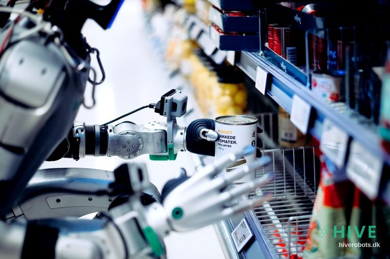 Unitree G1 humanoid robot reaching for a supermarket shelf